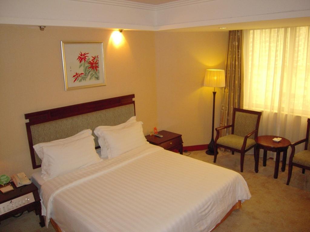 De Sense Hotel Guangdong Kanton Zimmer foto